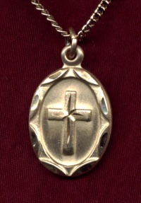 Oval Framed Gold Cross Necklace